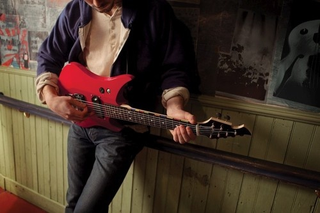 Illustration for article titled New Game Riffs On Guitar Hero, With A Real Electric Guitar